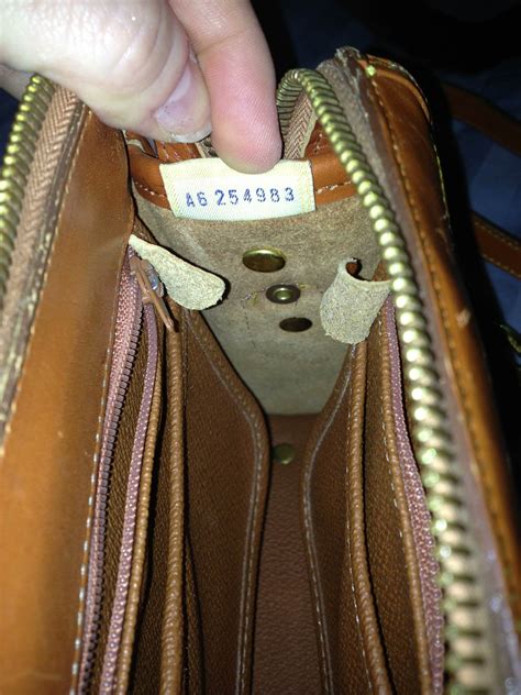 how to spot a fake dooney and bourke|dooney and bourke bag spotting.